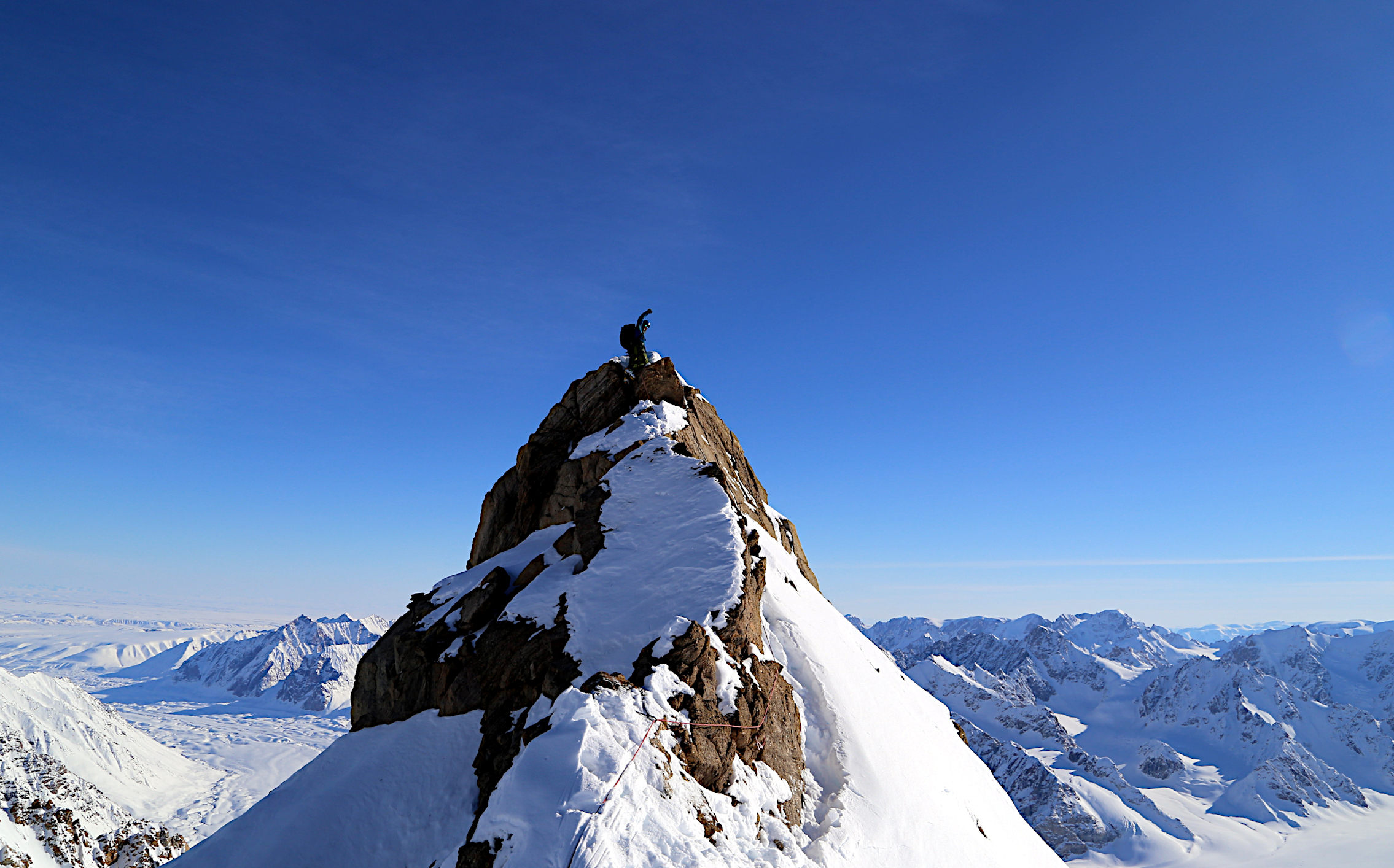 Photo of me on the first ascent of Boughfell, the second preivous unclimbed peak we climbed during the 2017 Greenland Expedition.